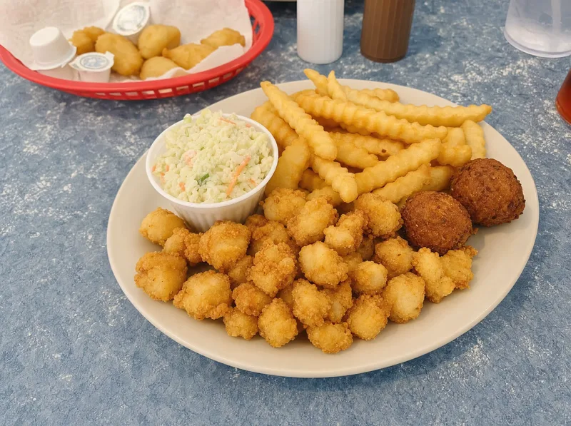 Calabash-style fried scallop plate with hushpuppies, slaw and fries